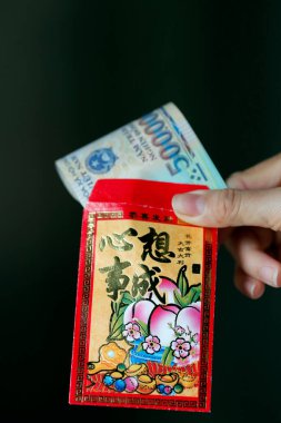 Çin Yeni Yılı. Şanslı kırmızı para zarfı. Ho Chi Minh Şehri. Vietnam.