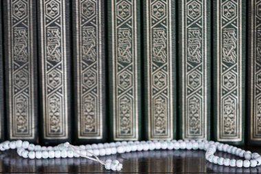 Putra Mosque or Masjid Putra.  Holy books of Quran and islamic prayer beads ( misbaha ).  Putrajaya. Malaysia. 