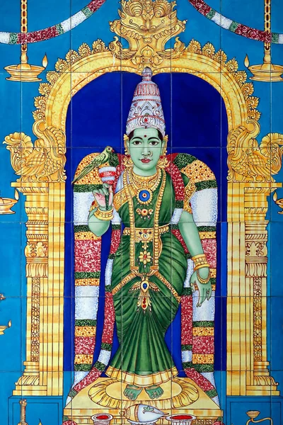 stock image Sri Mahamariamman Hindu Temple.  Hindu goddess  Meenakshi with a green parrot perching on her right hand.  Kuala Lumpur. Malaysia. 