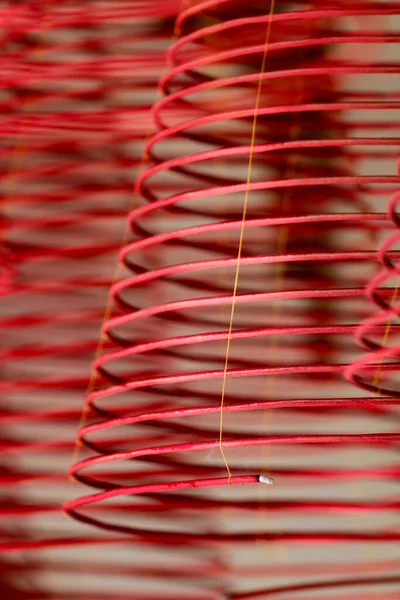 Huynh Dao Buddhist temple.  Red incense coils hang from the ceiling. Chau Doc. Vietnam.