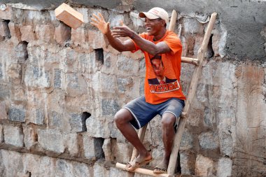 House construction site workers.  Madagascar. 