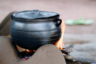 African kitchen in a village. Cooking pot on fire.  Datcha-Attikpaye. Togo. 