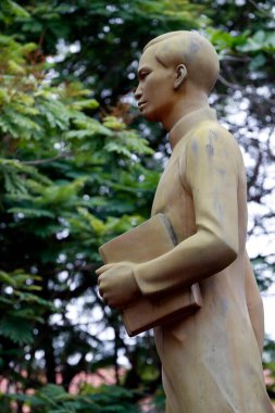 Quoc Hoc school. Nguyen Tat Thanh  ( President Ho Chi Minh). Statue.  Hue. Vietnam. 