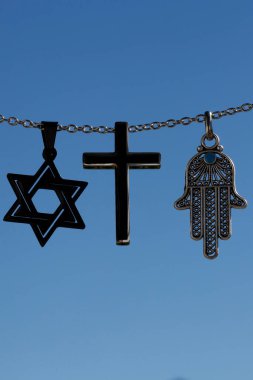 Dini semboller. Hristiyanlık, İslam, Musevilik 3 tek tanrılı din. Dinler arası diyalog.  