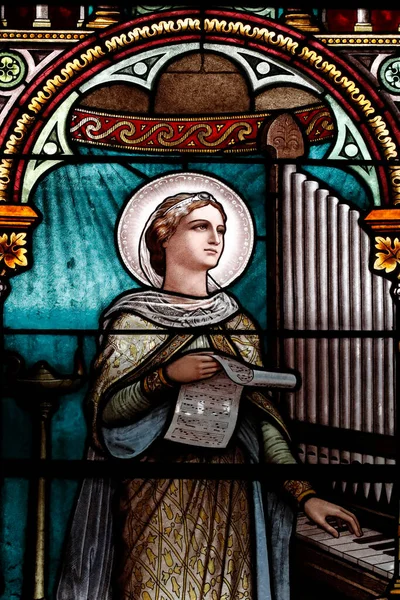 stock image Saint Francis de Sales Church.  Stained glass window. Saint Cecilia playing the pipe organ.  Geneva. Switzerland. 