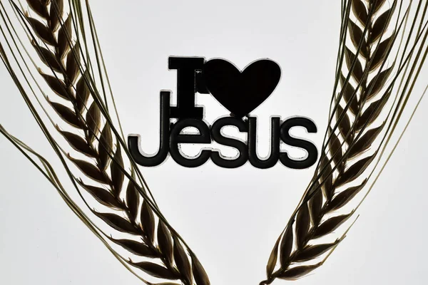 I love Jesus  and ears of wheat. Church symbol.