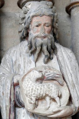 Boyalı portal. Aziz John, Vaftizci. Lozan 'daki Notre Dame Katedrali. İsviçre.