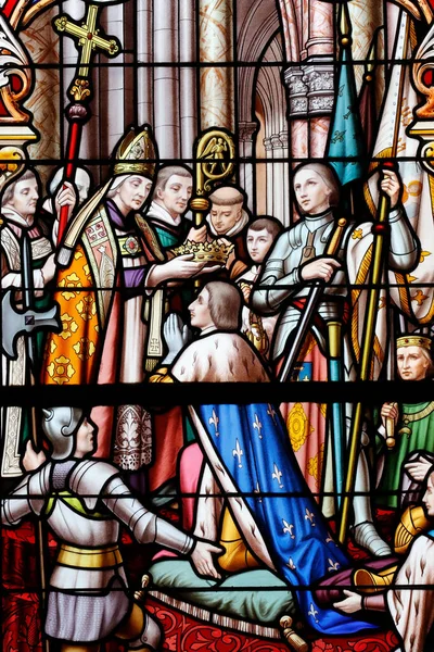 stock image Saint Thomas of Cantorbery church.  Stained glass window.  Joan of Arc at the coronation of Charles VII. Cuiseaux. France. 