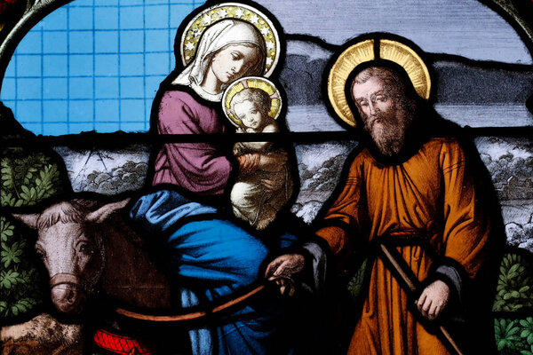 Cordeliers church.  Stained glass window.  The Flight into Egypt. Holy Family.  Lons le Saunier. France. 