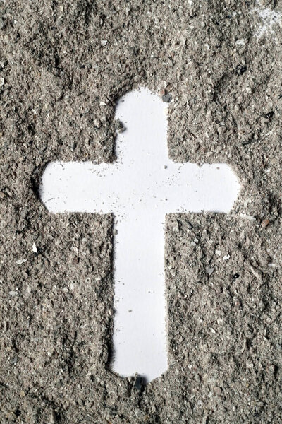 Cross made of ashes. Ash Wednesday. Lent season. 