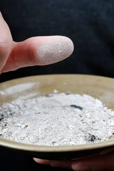 stock image Close-up on hands and ashes.  Ash Wednesday celebration. Lent season. 