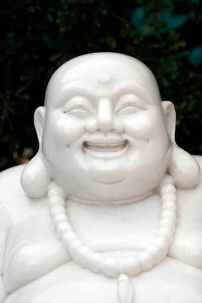 Tu Quang buddhist temple.  Laughing Buddha  statue for health, wealth and  prosperity. Nice. France.