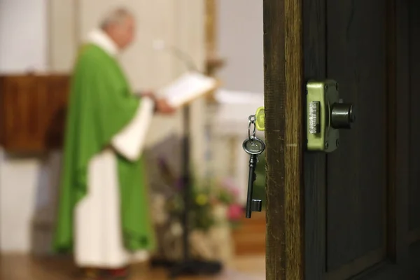 stock image Catholic church.  Key on the door of the sacristy.  Catholic mass.  France. 