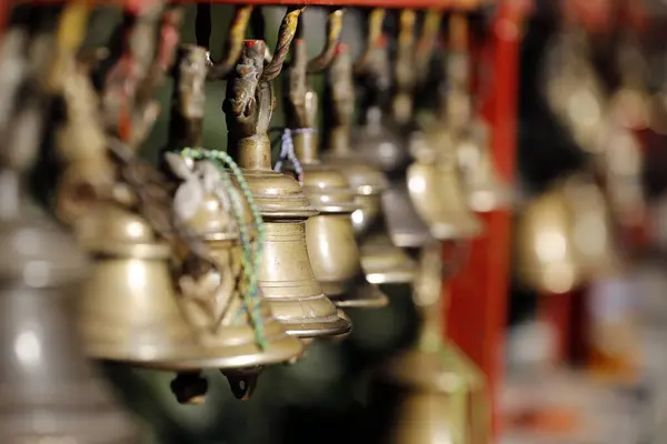 stock image Sacred bells in a hindu temple.  Dakshinkali Temple or Dakshin Kali Temple.  Nepal. 