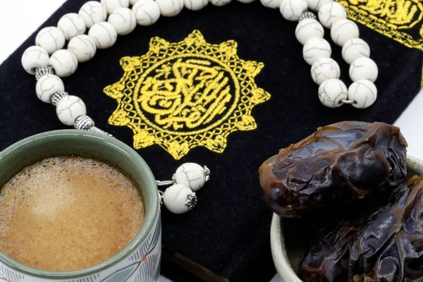 stock image Holy Quran book  with prayer beads, dates and coffee. Faith and religion. Ramadan concept.