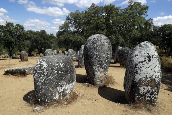 stock image The Cromlech of the Almendres is a megalithic complex. It is one of largest existing group of structured menhirs in Europe.  Portugal. 