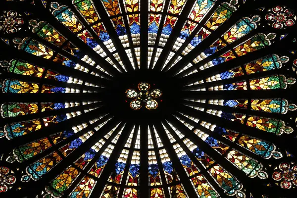 Strasbourg Cathedral.  Stained glass.  Large rose window by Erwin Steinbach, XII th century. Strasbourg. France.