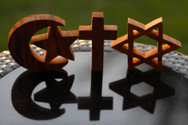 stock image Christianity, Islam and Judaism :  the three monotheistic religions. Jewish Star, Christian Cross and Muslim Crescent : Interreligious symbols. Interfaith dialogue concept.