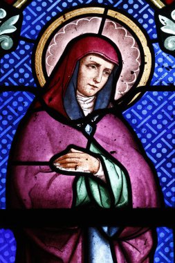 Katolik kilisesi. Lekeli cam pencere. Assisi 'li Amata fakir bir Clare rahibesiydi. Fransa.