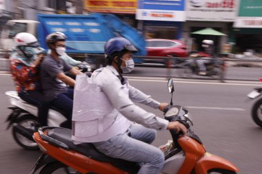 Ho Chi Minh şehrinde motosiklet trafiği. Vietnam. 