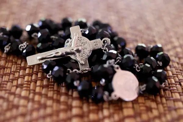 Rosary or prayer beads. Jesus on the cross. Crucifix