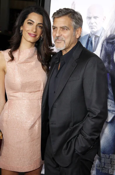 stock image Amal Clooney and George Clooney at the Los Angeles premiere of 