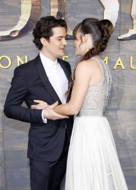 Orlando Bloom and Evangeline Lilly at the Los Angeles premiere of 'The Hobbit: The Desolation Of Smaug' held at the Dolby Theatre in Los Angeles, USA on December 2, 2013.