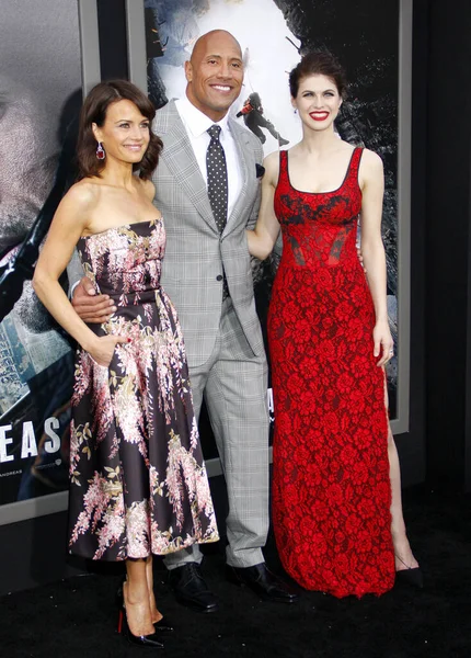 stock image Carla Gugino, Dwayne Johnson and Alexandra Daddario at the Los Angeles premiere of 'San Andreas' held at the TCL Chinese Theatre IMAX in Hollywood, USA on May 26, 2015.  