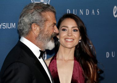 Mel Gibson ve Rosalind Ross Elysium sanat'ın 12 yıllık cennet şenlikte Los Angeles, ABD özel mekan 5 Ocak 2019 düzenlenen.