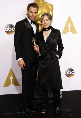 Milena Canonero and Chris Pine at the 87th Annual Academy Awards - Press Room held at the Loews Hollywood Hotel in Hollywood on February 22, 2015.  