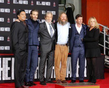 Gil Birmingham, Chris Pine, Jeff Bridges, David Mackenzie, Taylor Sheridan and Julie Yorn at Jeff Bridges Hand And Footprint Ceremony held at the TCL Chinese Theatre IMAX in Hollywood, USA on January 6, 2017.