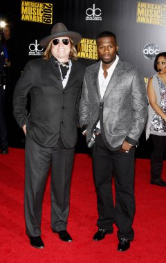 Val Kilmer and 50 Cent at the 2009 American Music Awards held at the Nokia Theater in Los Angeles on November 22, 2009.