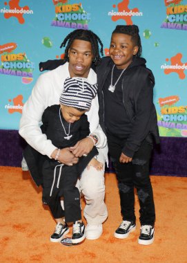 Loyal Jones, Lil Baby, and Jason Jones at the Nickelodeon Kids' Choice Awards 2023 held at the Microsoft Theater in Los Angeles, USA on March 4, 2023.