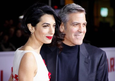 George Clooney ve Amal Clooney, 'Selam, Sezar!' filminin dünya prömiyerinde. 1 Şubat 2016 'da ABD' nin Westwood kentindeki Regency Village Tiyatrosu 'nda düzenlendi..