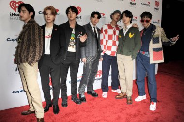 V, Suga, Jin, Jungkook, RM, Jimin and J-Hope of BTS at the 102.7 KIIS FM's Jingle Ball 2021 held at the Forum in Inglewood, USA on December 3, 2021. clipart