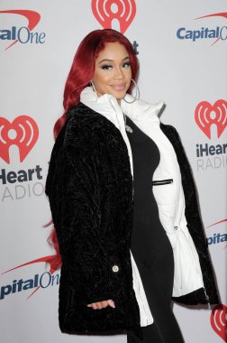 Saweetie, 3 Aralık 2021 tarihinde Inglewood, ABD 'de düzenlenen 102.7 KIIS FM' in Jingle Ball 2021 'de.