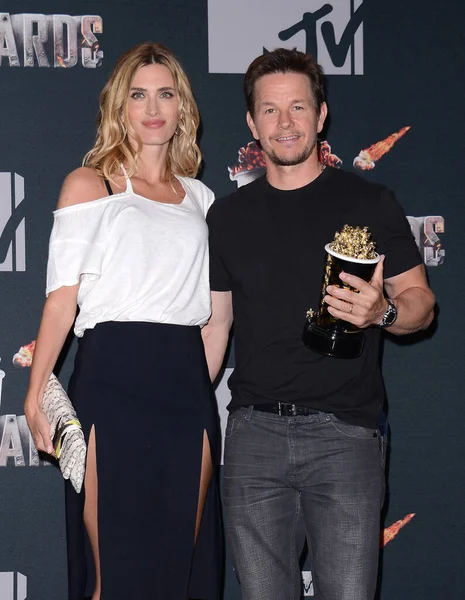 stock image Mark Wahlberg and Rhea Durham at the 2014 MTV Movie Awards - Press Room held at the Nokia Theatre L.A. Live in Los Angeles, USA on April 13, 2014.