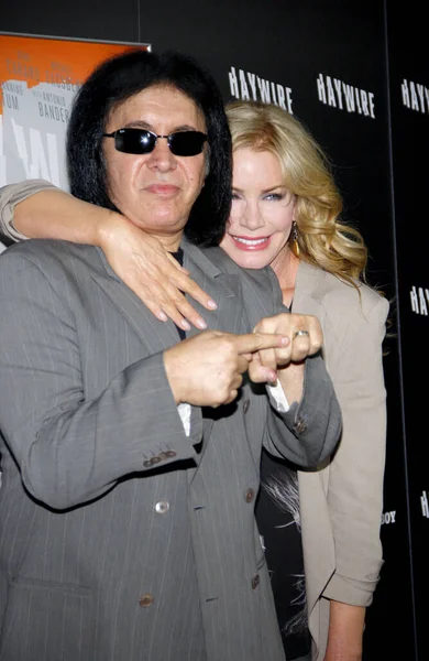 stock image Gene Simmons and Shannon Tweed at the Los Angeles premiere of 'Haywire' held at the DGA Theater in Hollywood, USA on January 5, 2012.