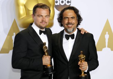 Leonardo DiCaprio and Alejandro Gonzalez Inarritu at the 88th Annual Academy Awards - Press Room held at the Loews Hollywood Hotel in Hollywood, USA on February 28, 2016. clipart