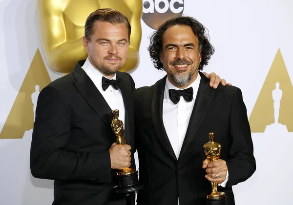 stock image Leonardo DiCaprio and Alejandro Gonzalez Inarritu at the 88th Annual Academy Awards - Press Room held at the Loews Hollywood Hotel in Hollywood, USA on February 28, 2016.