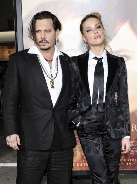 Johnny Depp and Amber Heard at the Los Angeles premiere of 'The Danish Girl' held at the Westwood Village Theatre in Westwood, USA on November 21, 2015. 