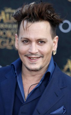 Johnny Depp, 23 Mayıs 2016 'da ABD' nin Hollywood kentindeki El Capitan Tiyatrosu 'nda düzenlenen' Alice Through The Looking Glass 'filminin Los Angeles galasında.