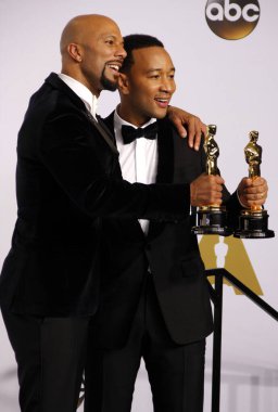 Common ve John Legend, 87. Geleneksel Akademi Ödülleri 'nde Los Angeles' taki Loews Hollywood Oteli 'nde düzenlenen basın odasında. 22 Şubat 2015.  