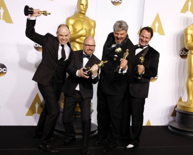 Andrew Lockley, Ian Hunter, Scott R. Fisher ve Paul Franklin, Los Angeles 'taki Loews Hollywood Oteli' nde düzenlenen 87. 22 Şubat 2015.  