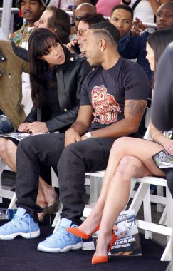 Michelle Rodriguez ve Ludacris, Los Angeles 'taki TCL Çin Tiyatrosu IMAX' te düzenlenen el ve ayak iziyle ölümsüzleştirilmiş Vin Diesel 'de. 1 Nisan 2015.  