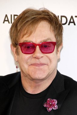 Elton John, 24 Şubat 2013 'te ABD' nin Kaliforniya eyaletinin Batı Hollywood şehrindeki Pacific Design Center 'da düzenlenen 21..   