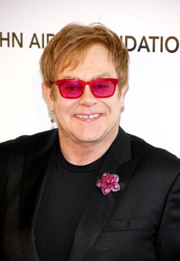 Elton John, 24 Şubat 2013 'te ABD' nin Kaliforniya eyaletinin Batı Hollywood şehrindeki Pacific Design Center 'da düzenlenen 21..   
