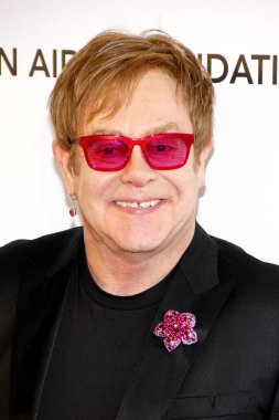 Elton John, 24 Şubat 2013 'te ABD' nin Kaliforniya eyaletinin Batı Hollywood şehrindeki Pacific Design Center 'da düzenlenen 21..   