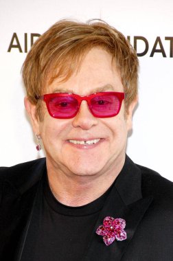 Elton John, 24 Şubat 2013 'te ABD' nin Kaliforniya eyaletinin Batı Hollywood şehrindeki Pacific Design Center 'da düzenlenen 21..   