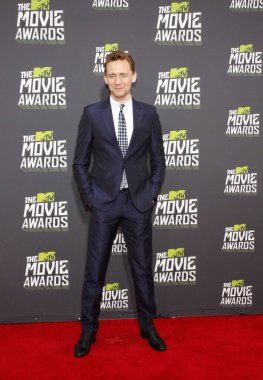 Tom Hiddleston, 14 Nisan 2013 'te ABD' nin Los Angeles kentindeki Sony Pictures Stüdyolarında düzenlenen 2013 MTV Film Ödülleri 'nde.